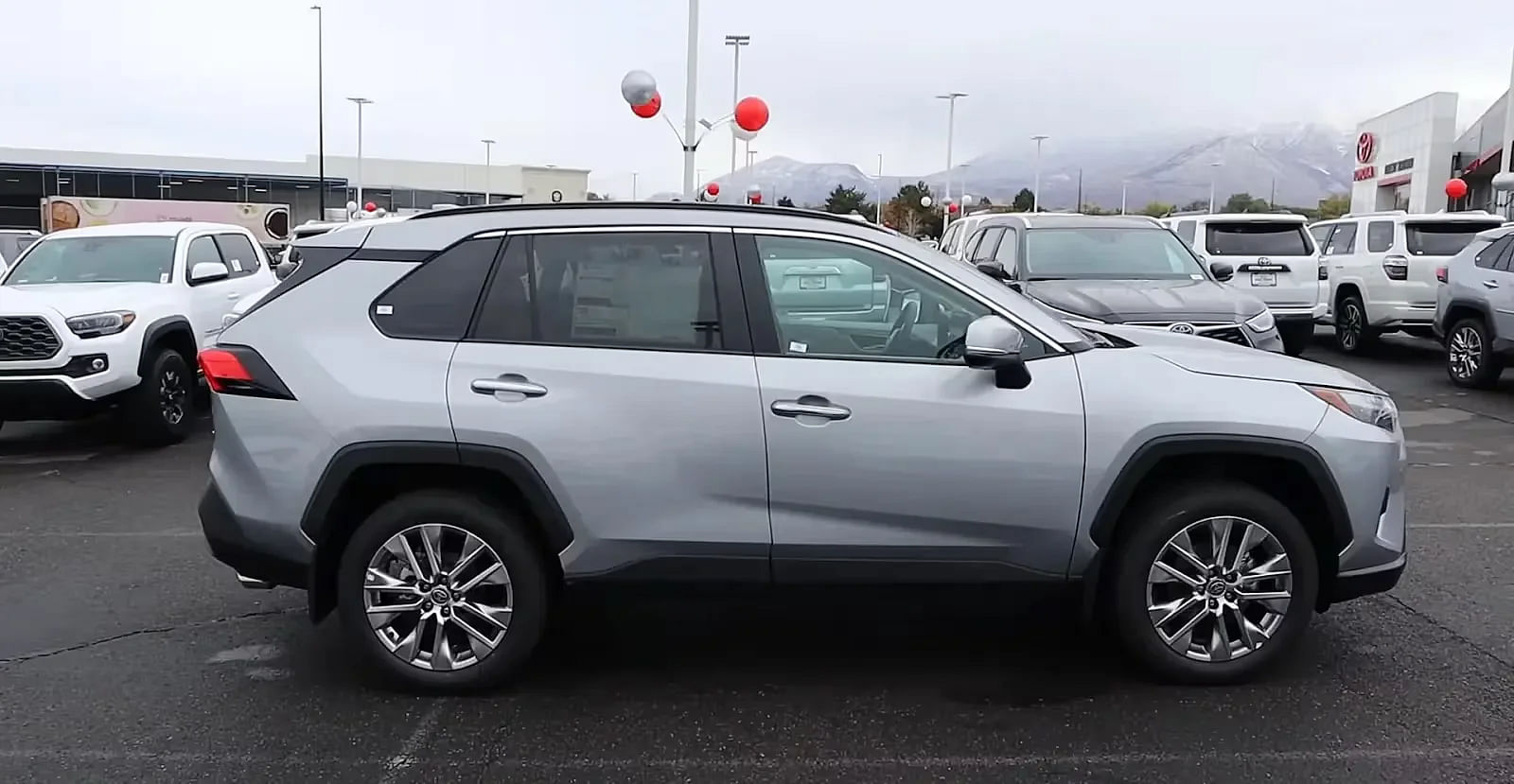 Silver 2024 Toyota RAV4 SUV Side Profile