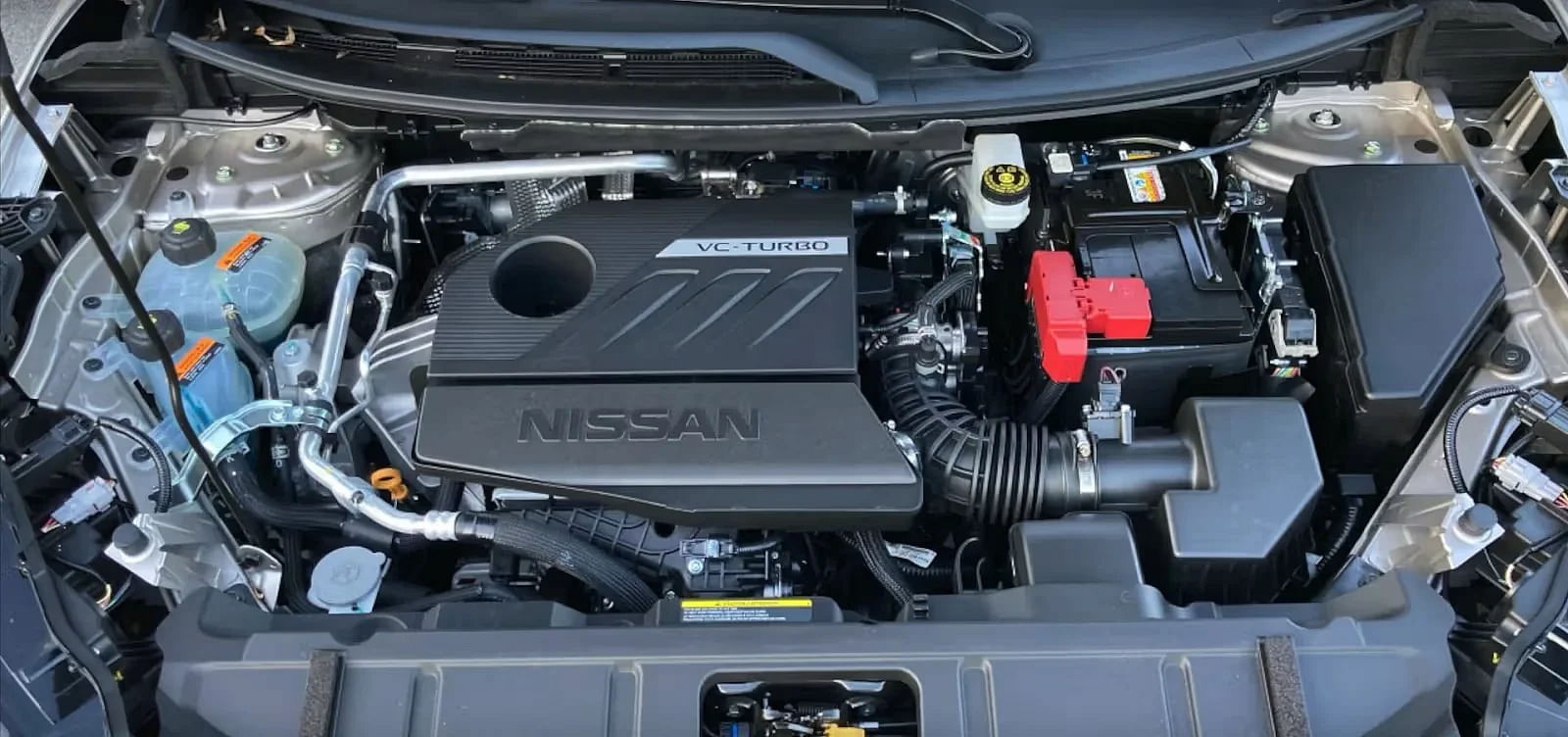 Blue 2024 Nissan Rogue Engine